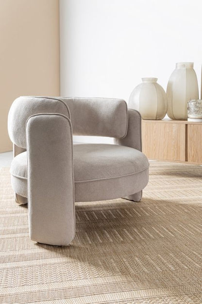Poltrona in tessuto beige