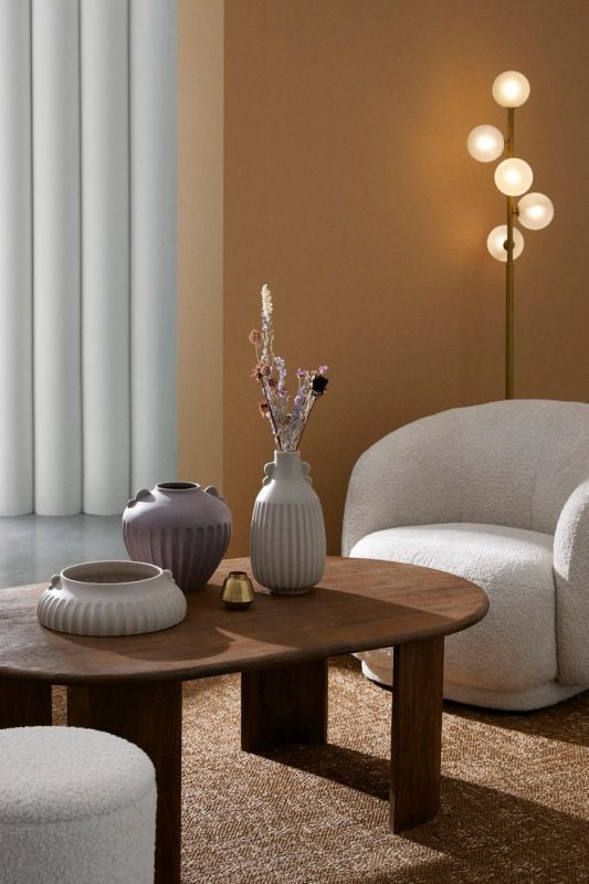 Poltrona effetto bouclè naturale